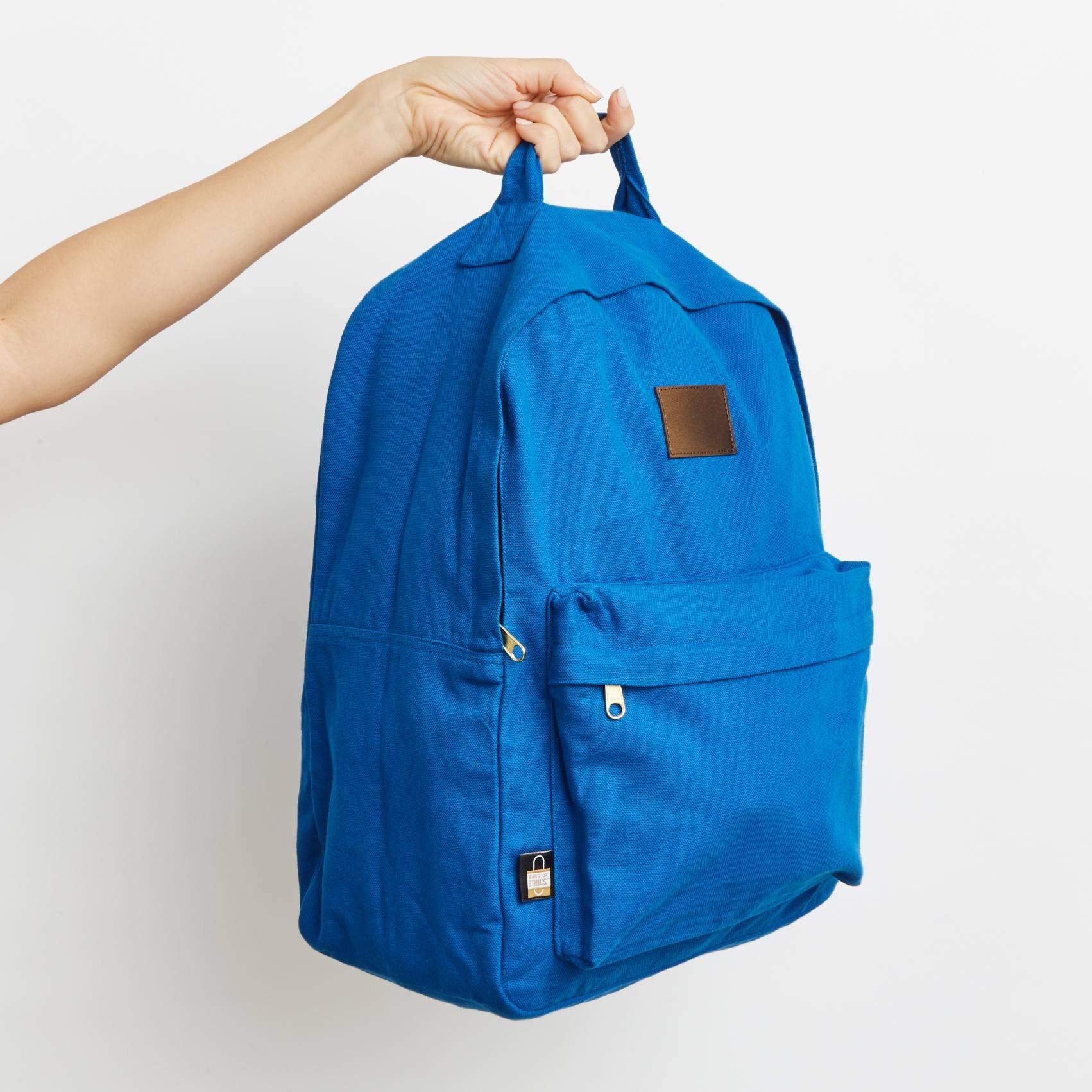 Custom made canvas Backpack for adult – blue – side view Custom made canvas Backpack for adult - blue - side view from supreme creations